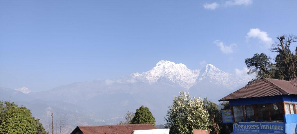 A trekker enjoying the view while hiking around the hills of Kathmandu Valley