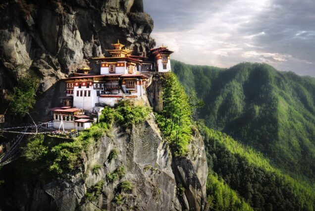 The iconic Tiger's Nest Monastery clinging to a cliffside during a Bhutan Tour.
